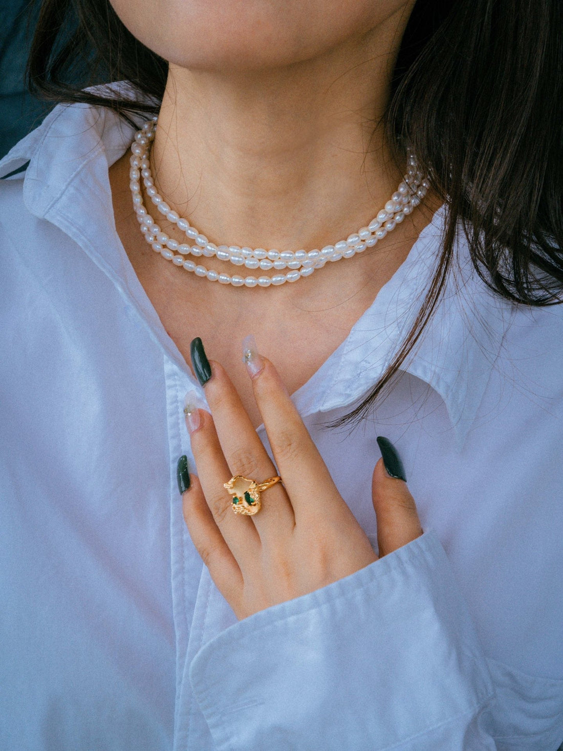 How to Layer Jewelry Like a Pro: A 2024 Guide to Effortless Style